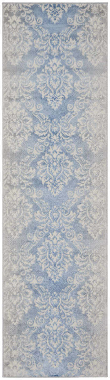Close-up of the Nourison Elation Ivory Blue Vintage Area Rug, featuring a high-pile, machine-made construction.