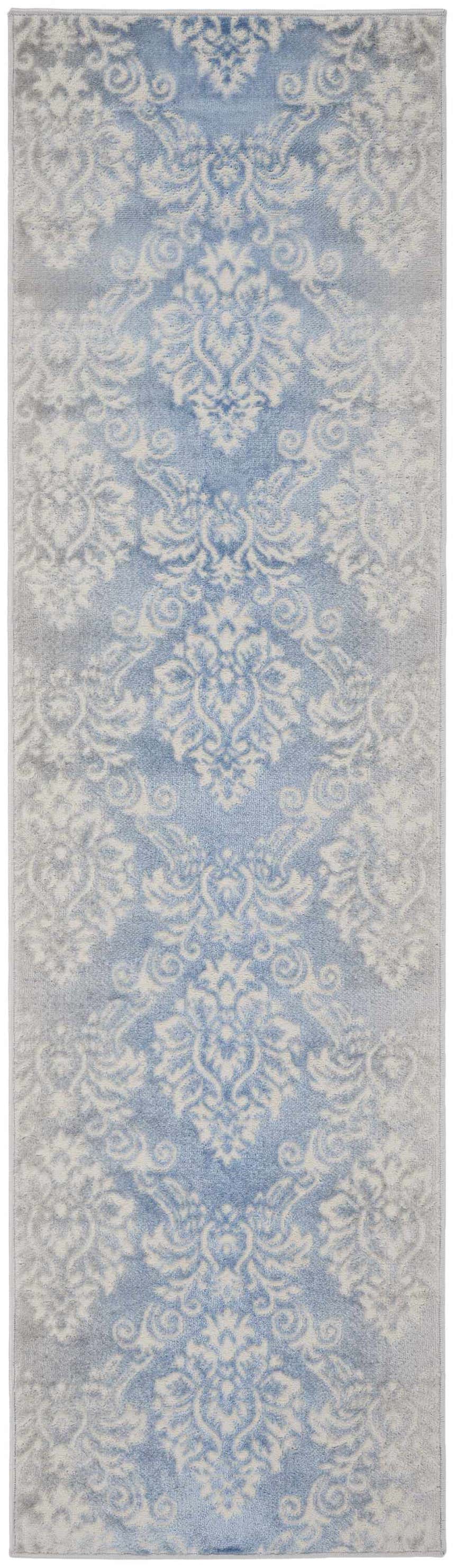 Close-up of the Nourison Elation Ivory Blue Vintage Area Rug, featuring a high-pile, machine-made construction.