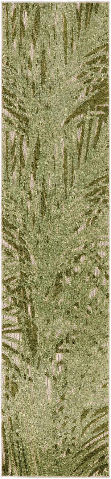 Close-up of the Nourison Aloha Ivory Green Outdoor Area Rug featuring a leafy green pattern.