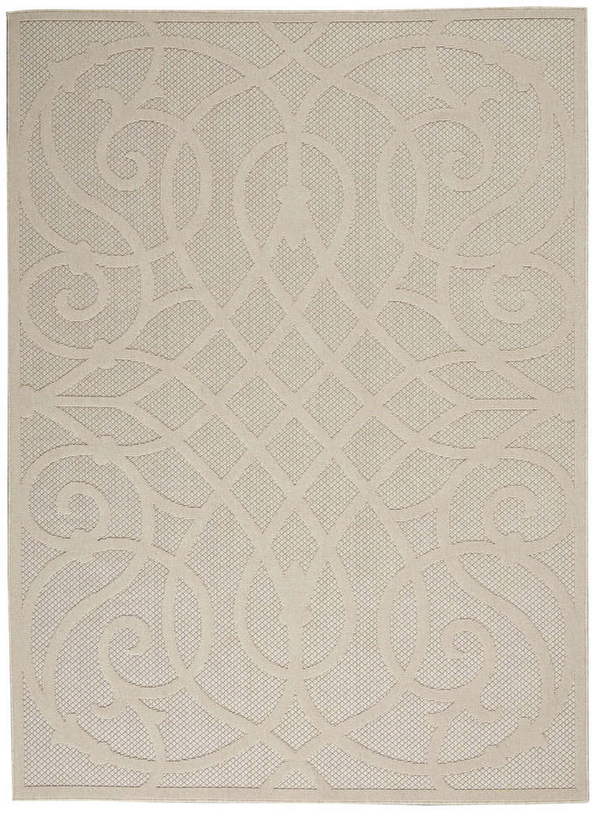 Close-up of the cream Nourison Cozumel Farmhouse Area Rug. Features a lattice and scroll pattern.