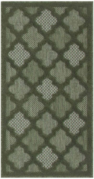 Close-up of the Nourison Easy Care Green Modern Area Rug, featuring a geometric quatrefoil pattern and textured weave.