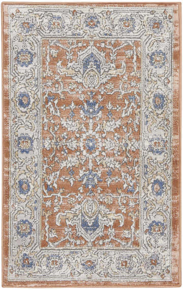 Close-up of the Nicole Curtis Series 4 rug. Vintage style with gray, multicolor, floral pattern, and long pile texture.