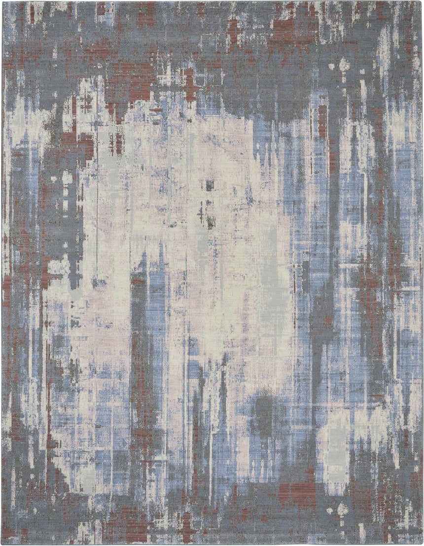 Close-up of the Nourison Artworks Multicolor rug, featuring a modern abstract pattern in gray, blue, red, and white hues.
