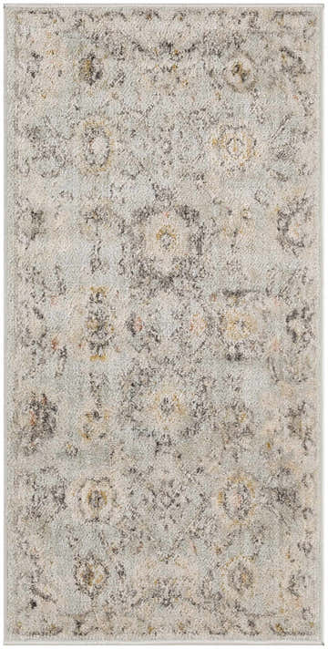 Close-up of the Nourison Oushak Home Mint Vintage Area Rug, showcasing its distressed green, gray, and gold vintage design.