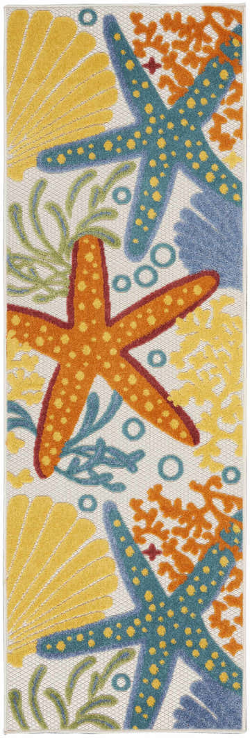 Close-up of Nourison Aloha Multicolor rug with starfish, coral, and shells in yellow, orange, and blue hues. Coastal style.
