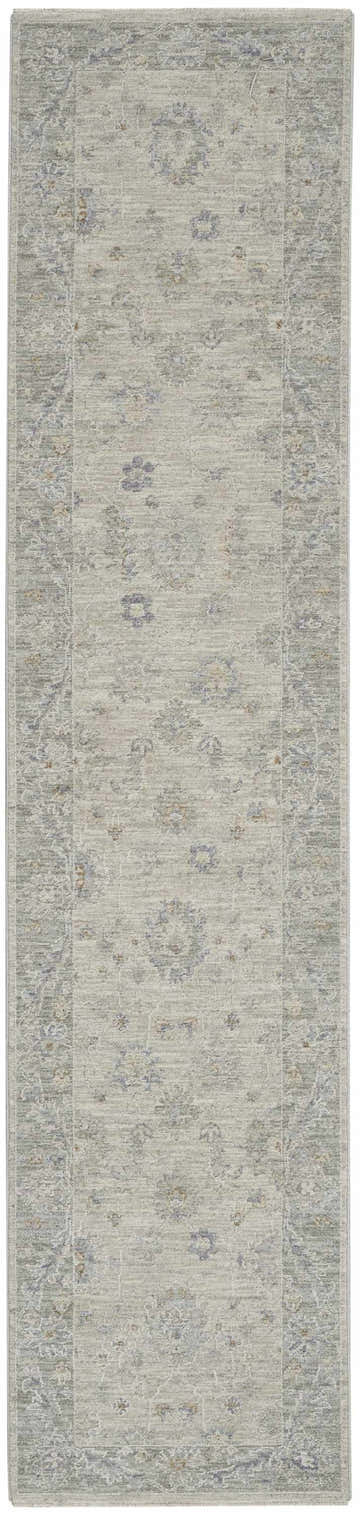 Close-up of the Nourison Infinite Light Grey Vintage runner rug, showing its floral pattern and soft, muted colors.
