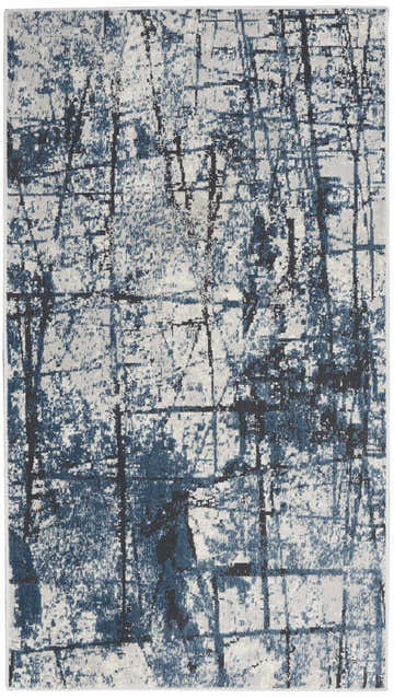 Close-up of Calvin Klein CK970 Vapor Grey Blue rug. Abstract pattern with blue, gray, and black hues. Modern design.