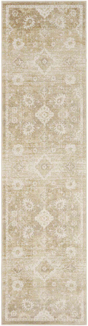 Close-up of the Nourison Astra Ivory Gold Vintage Rug, a washable runner with a subtle floral pattern and chestnut accents.