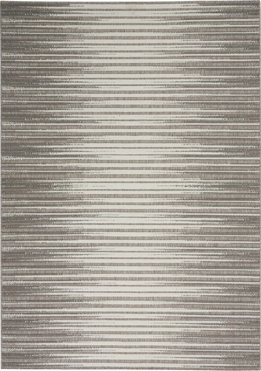 Close-up of the Nourison Key Largo Light Grey rug, featuring a contemporary horizontal stripe pattern and subtle texture.