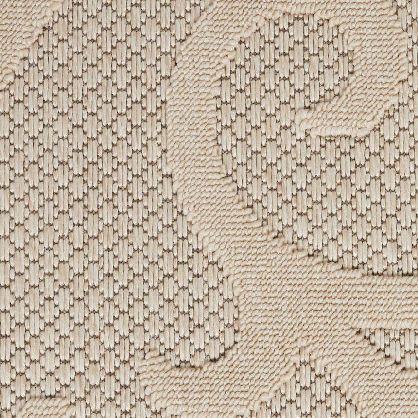 Close up of the cream Nourison Cozumel Farmhouse Area Rug showing its woven texture and subtle geometric pattern.