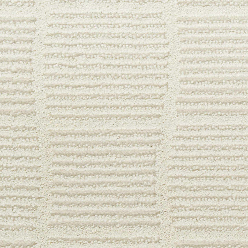 Close-up of the ivory Nourison Eco Cycle Rug featuring a textured, modern striped pattern.