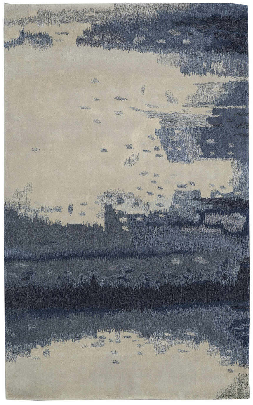 Close-up of the Calvin Klein Home Luster Wash Shade rug. Sandstone and blue abstract design. Handmade wool and poly rug.