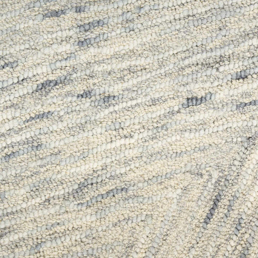 Close-up of the textured DKNY Pure Angles Grey rug. Handmade pile with a subtle, modern design.