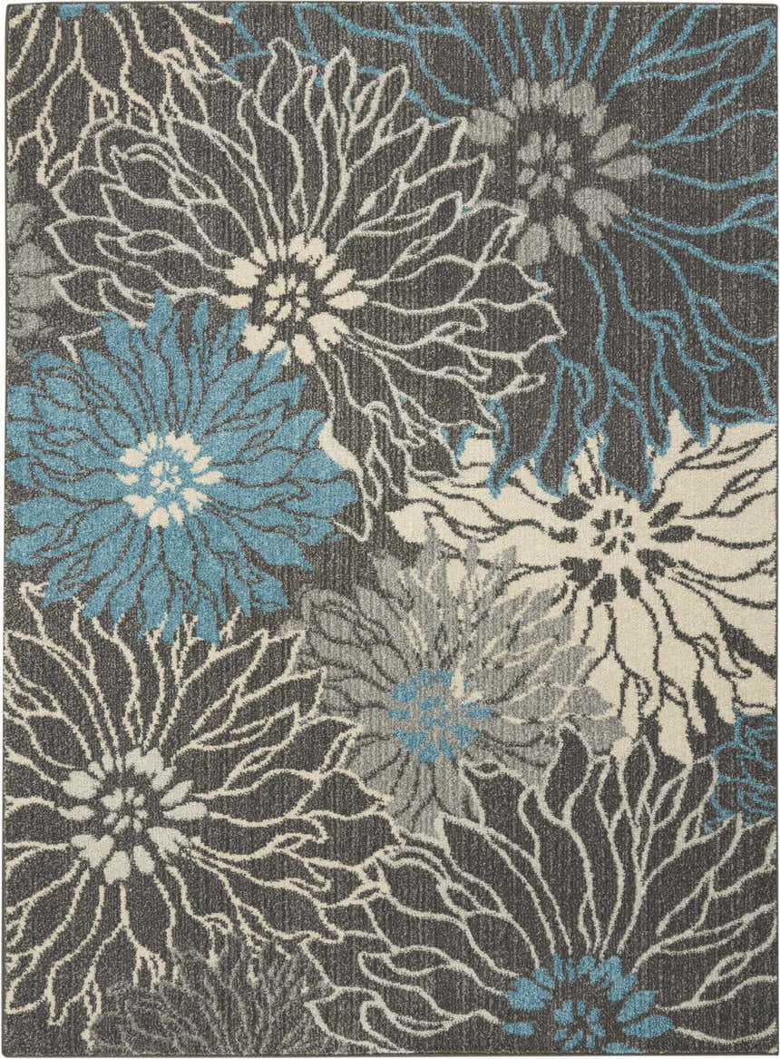 Close-up of Nourison Passion Charcoal Blue rug. Taupe floral design with blue accents on a textured, machine-made polypropylene rug.