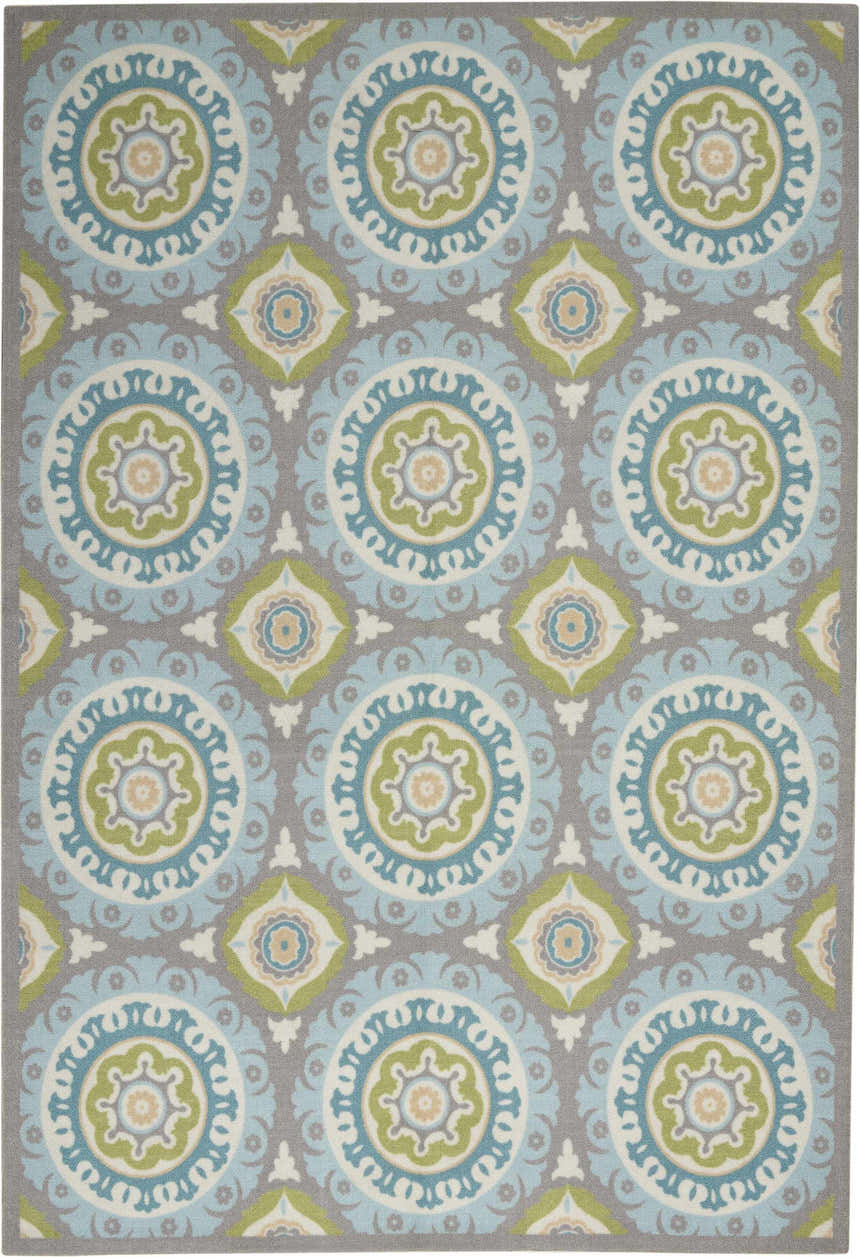 Close-up of Waverly Sun N' Shade Jade rug, showcasing a coastal-inspired medallion pattern in jade, blue, and gray tones.