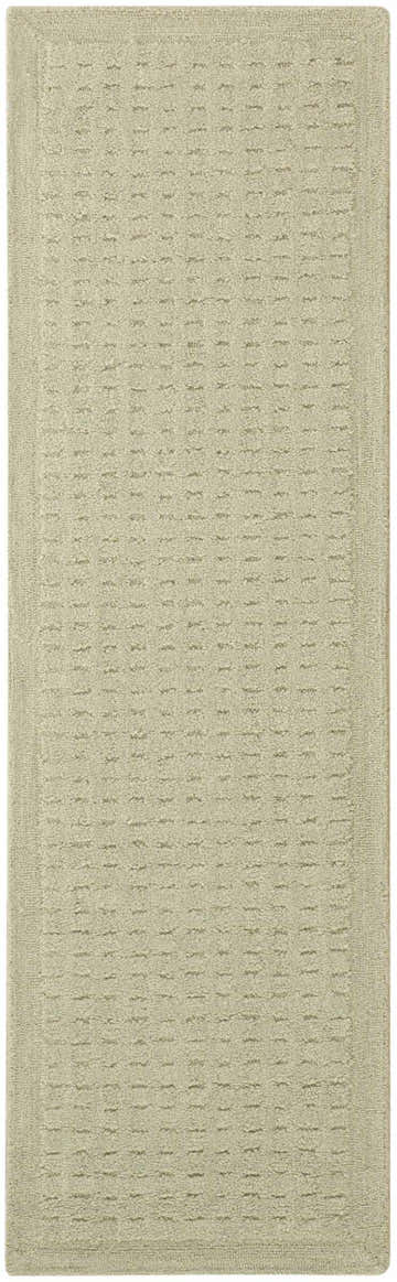 Close-up of DKNY Pure Grids Light Green rug. Contemporary style with a subtle grid pattern and soft pile.