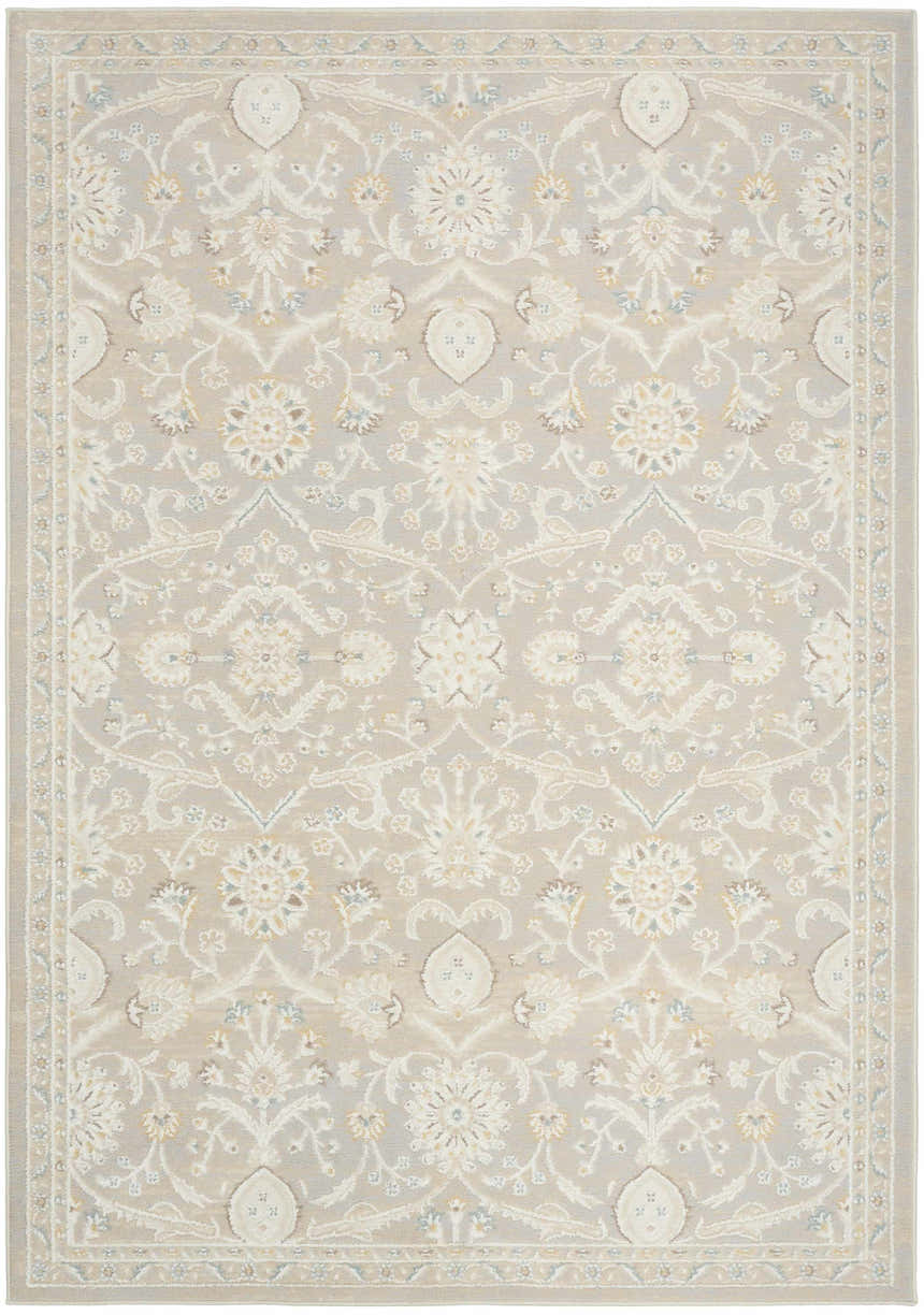 Close-up of the Nourison Isla Light Grey Vintage Area Rug, showing floral pattern and soft, high pile texture.