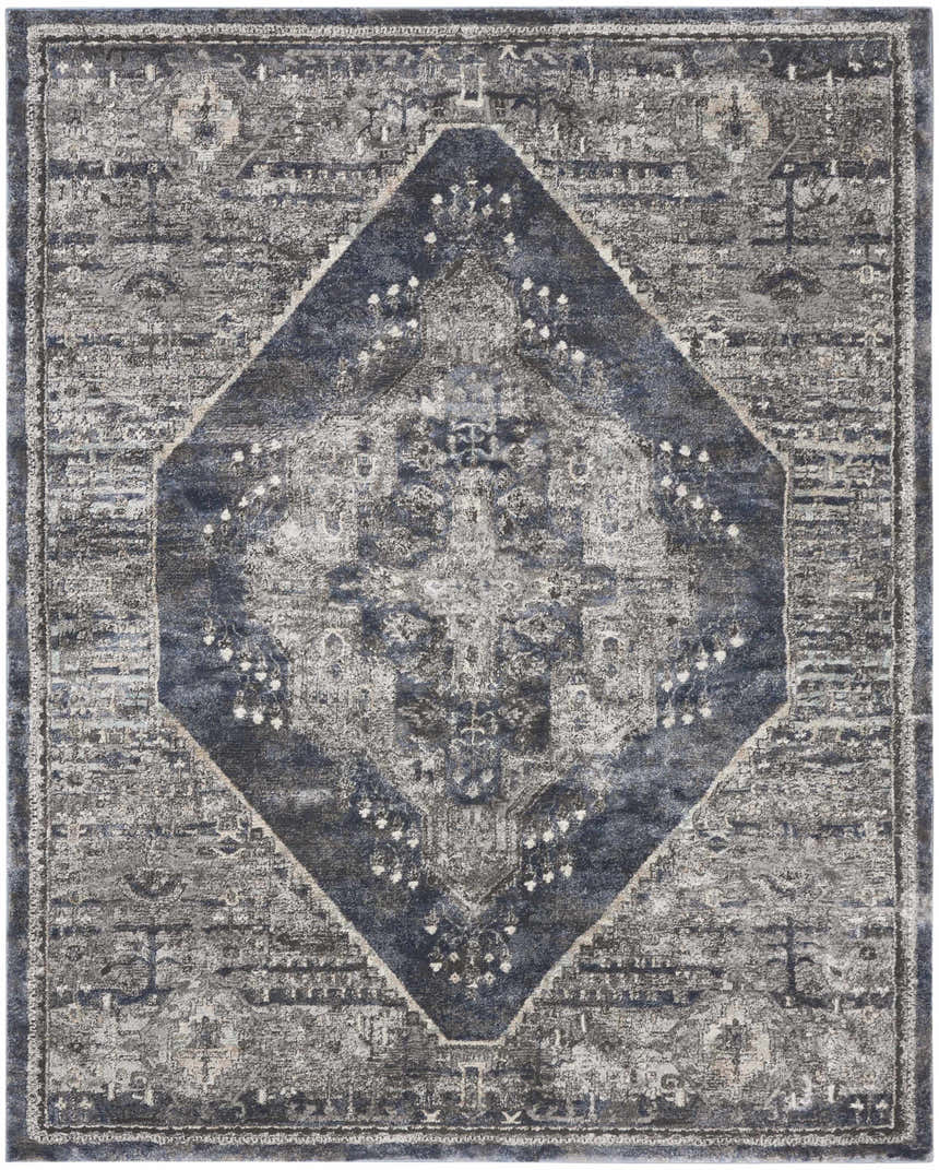 Close-up of the Nourison American Manor Blue Farmhouse Area Rug featuring a diamond pattern and distressed design.