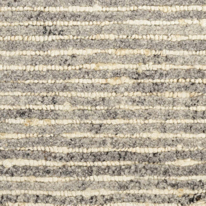 Close-up of the Calvin Klein Kathmandu Grey rug, showing wool and jute texture with horizontal stripes.