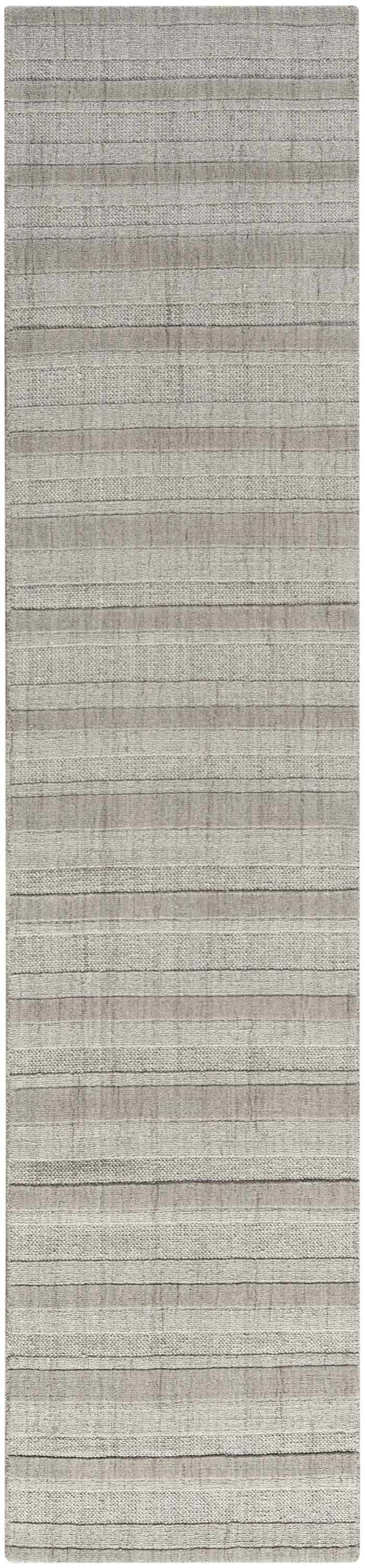 Close-up of the DKNY Pure Multi Weave Grey rug. Contemporary style with alternating textured stripes.