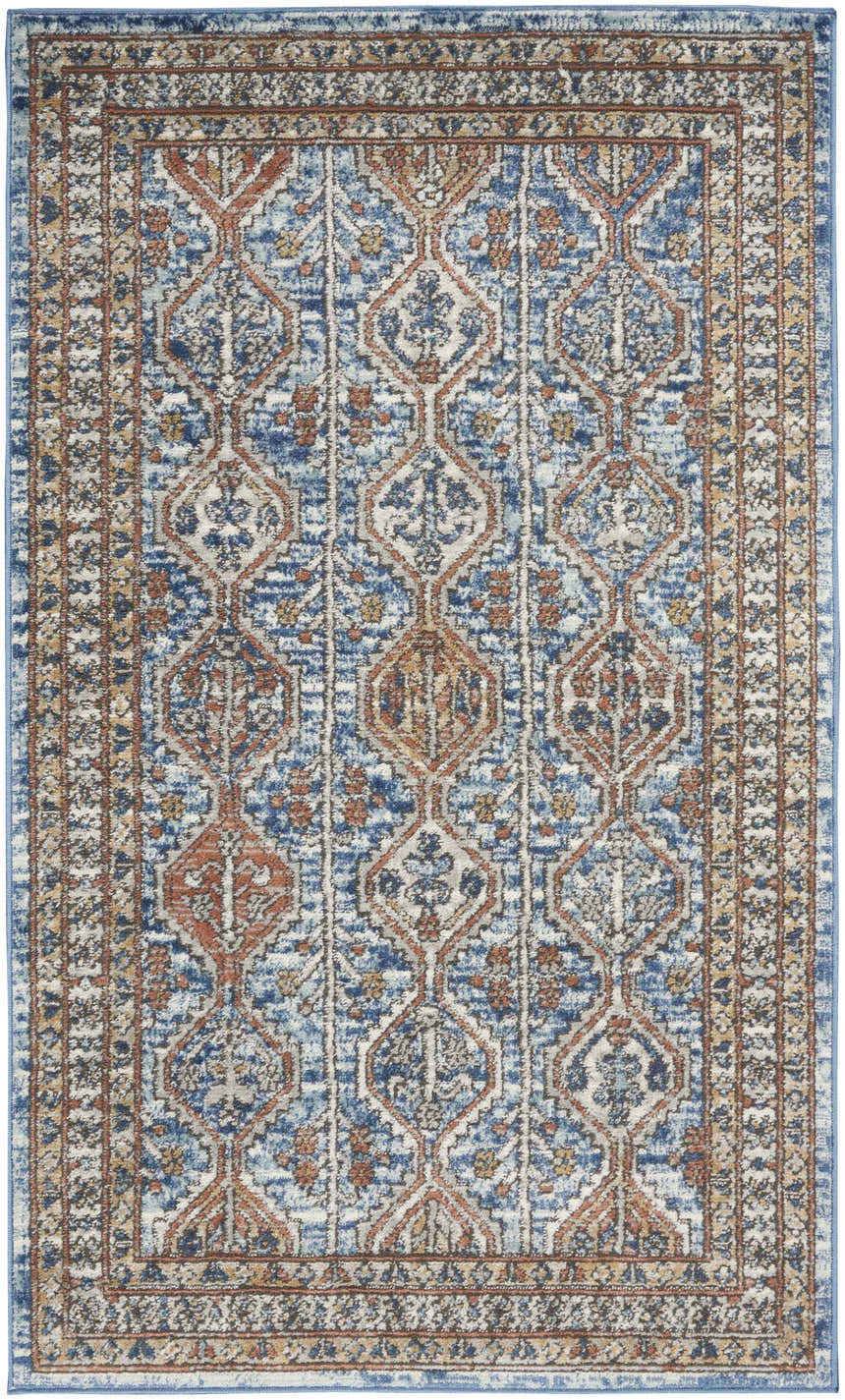 Nourison Quarry Blue Multicolor Rug. Contemporary rug with geometric pattern in blue, rust, and cream hues.