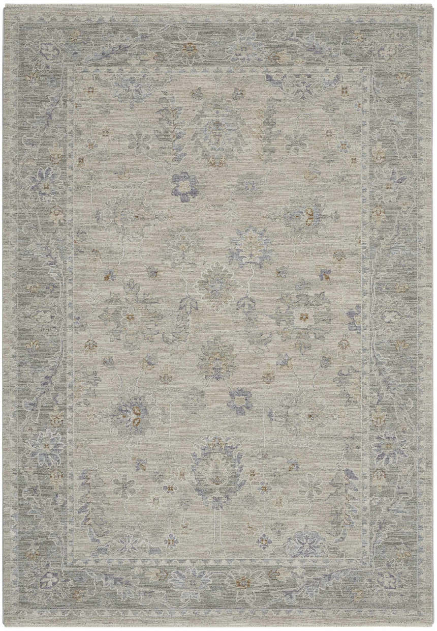 Close-up of the Nourison Infinite Light Grey Vintage Indoor Area Rug, showcasing its floral pattern and soft, muted colors.