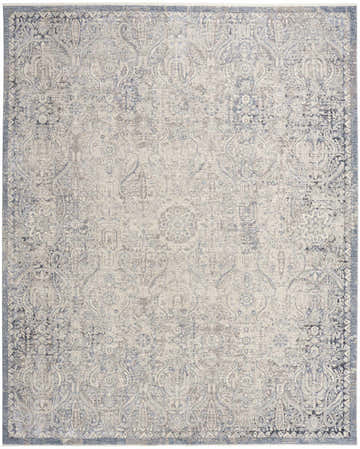 Close-up of Nourison Sultana Grey Blue Vintage Area Rug. Distressed floral pattern in shades of blue and gray.