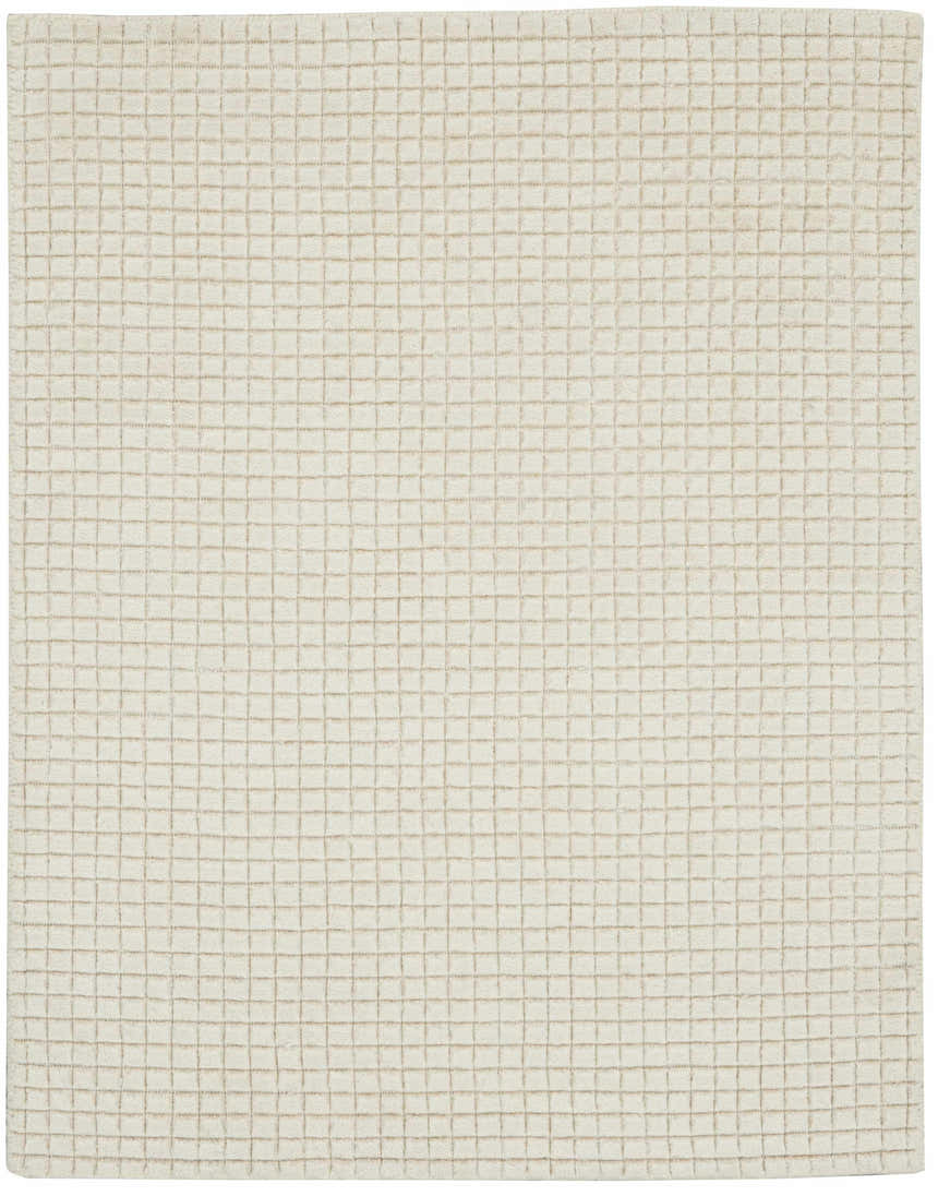 Close-up of the Calvin Klein Pretoria Ivory rug showing the handmade mohair wool texture and grid pattern.