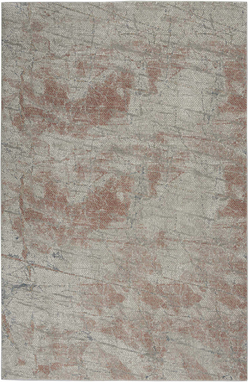Close-up of Nourison Rustic Textures Light Grey Rust rug. Modern design with light gray and rust colored abstract pattern.