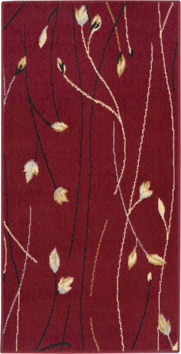 Close-up of the Nourison Grafix Red Contemporary Indoor Area Rug, featuring a floral pattern with red, white, gold, and black.