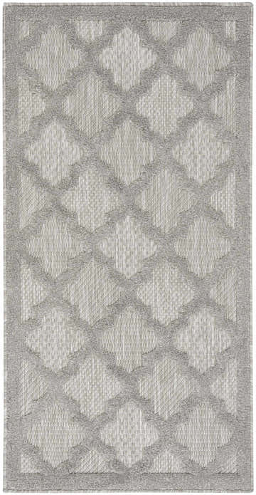 Close-up of the Nourison Easy Care Silver Grey Modern Area Rug, featuring a geometric diamond pattern and soft texture.