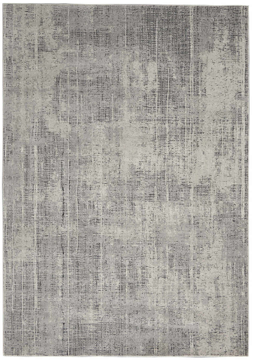 Close-up of the Calvin Klein CK970 Vapor Grey Ivory rug featuring a textured, abstract grid pattern in shades of gray and ivory.