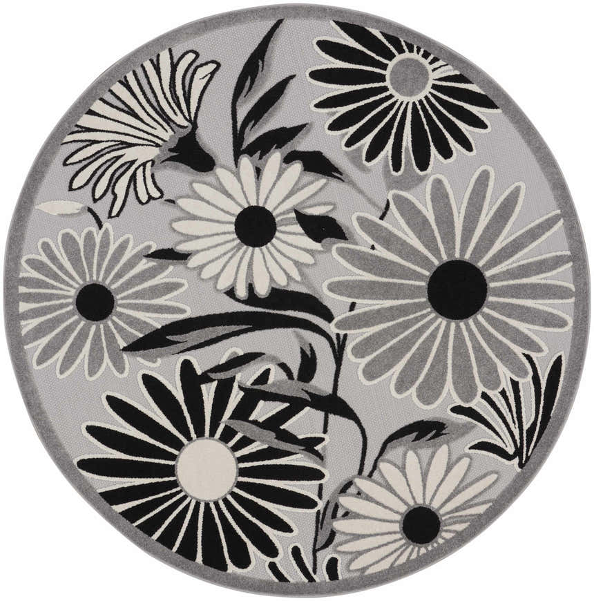Close-up of round Nourison Aloha Black White Outdoor Area Rug with black, white, and gray floral pattern.