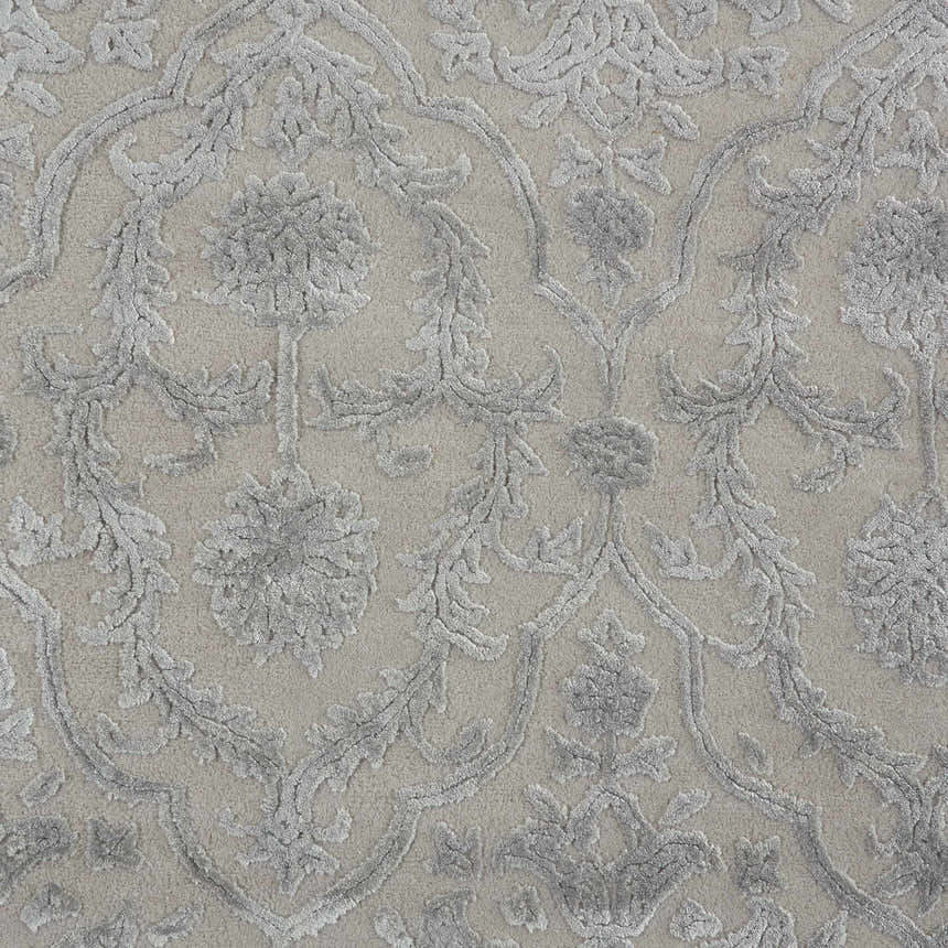 Close-up of the Nourison Opaline Taupe Vintage Area Rug showing floral and vine pattern, soft texture, and neutral ivory color.