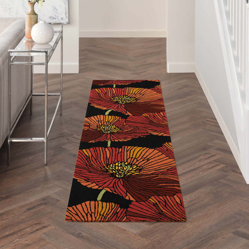 Hallway scene with Nourison Fantasy Black runner rug featuring a bold floral pattern in red, orange, and yellow.
