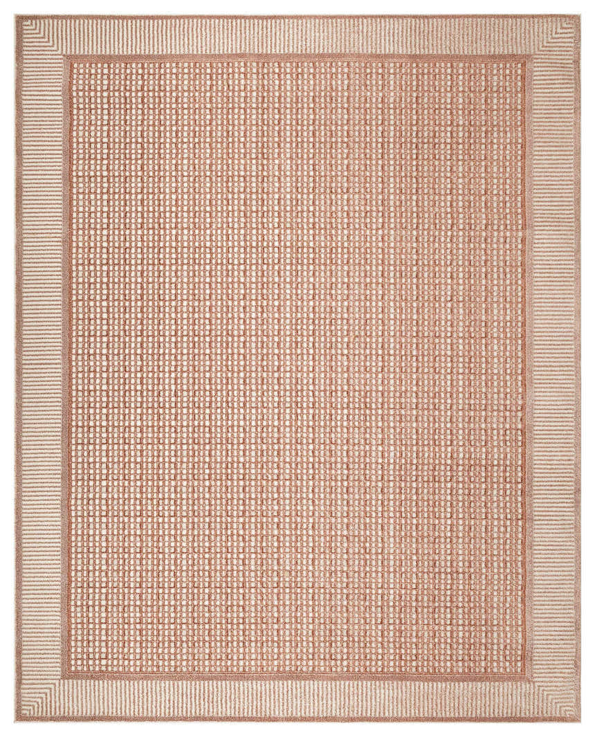 Close-up of Nourison Nordic Brick Ivory rug showing chestnut grid pattern and textured border.