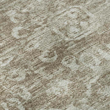 Close-up of the textured Dalyn Aberdeen AB1 Mushroom Washable Area Rug in shades of beige and taupe.