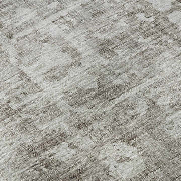 Close-up of the Dalyn Aberdeen AB2 Coffee Washable Area Rug. Features a farmhouse style pattern in coffee, taupe and shades of brown.