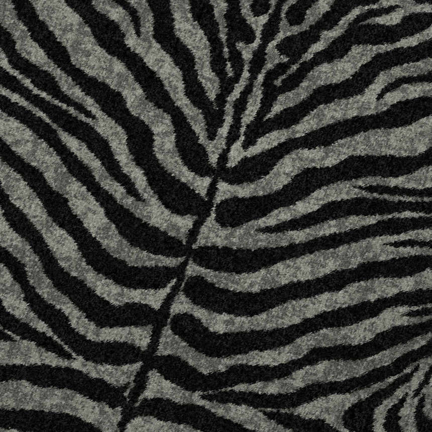 Close-up of Dalyn Akina AK1 Midnight Washable Area Rug with black and taupe zebra stripe pattern.