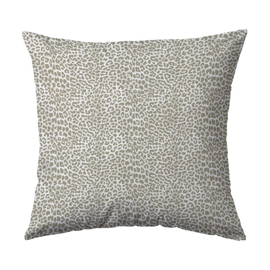 Close-up of a decorative pillow with a chestnut and ivory leopard print pattern.