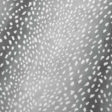 Close up of the Dalyn Akina AK3 Flannel Washable Area Rug, featuring a gray background and a white dotted pattern.