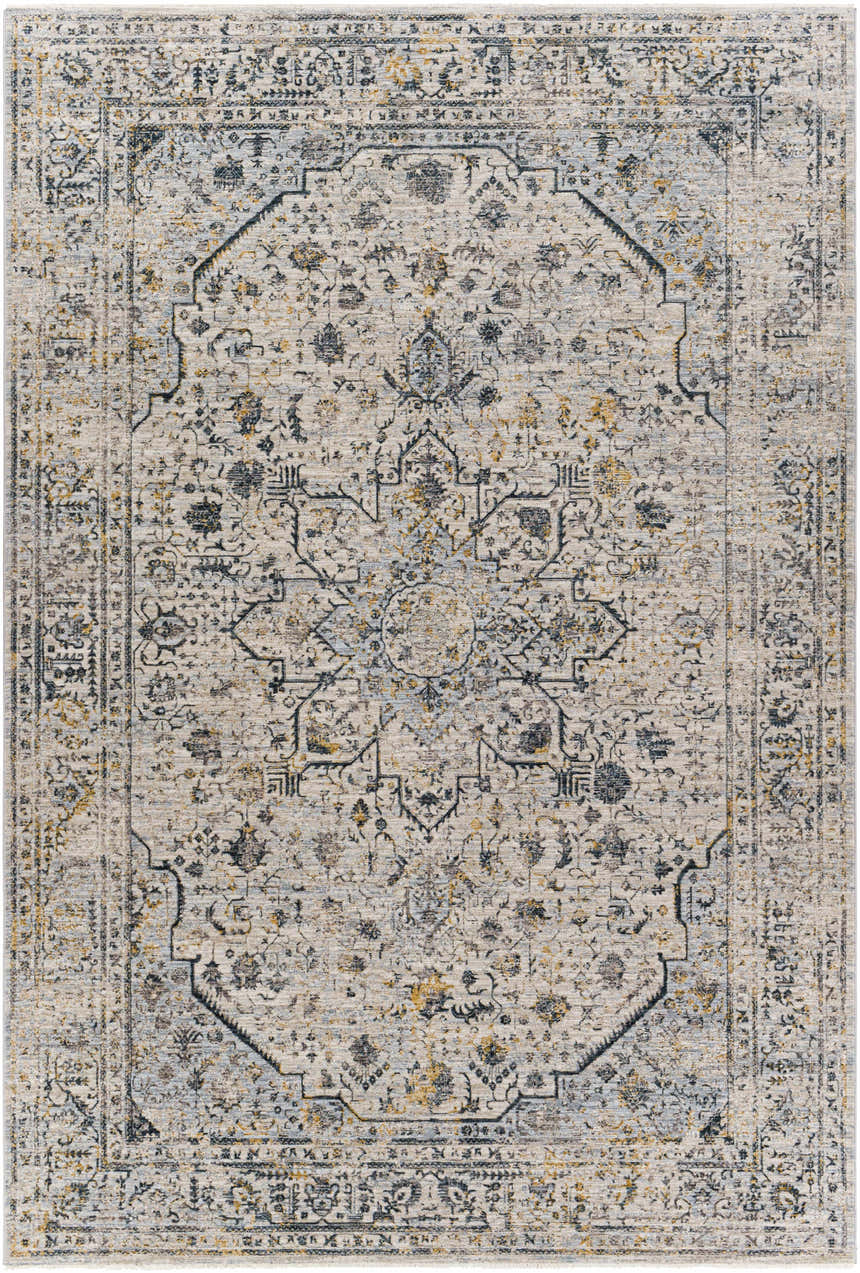 Close-up of the Anmoore Luxe Rug. Machine-woven polyester with a traditional Persian-style design in charcoal, cream, and mustard. Design-Rectangle-6796