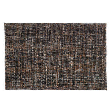 Close-up of the hand-loomed Dalyn Abruzzo AZ1 Black Area Rug. Woven texture in beige, black, brown, and taupe wool.