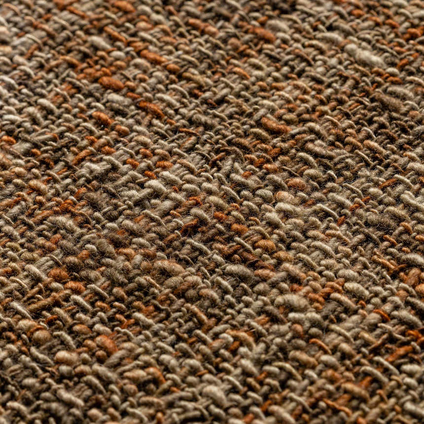 Close-up of the hand-loomed Dalyn Abruzzo AZ1 Spice area rug showing beige, brown, and paprika wool texture.
