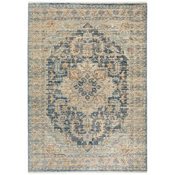 Close-up of the Dalyn Bergama BE3 Navy Area Rug with a traditional floral medallion pattern in beige, ivory, navy, and spice tones.