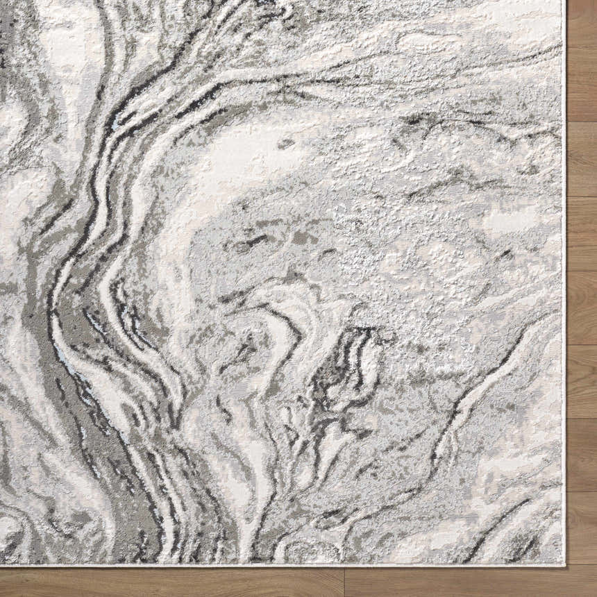 Close-up of Brandi Gray Marble Area Rug featuring a contemporary beige, cream, and gray marble-like pattern. Corner