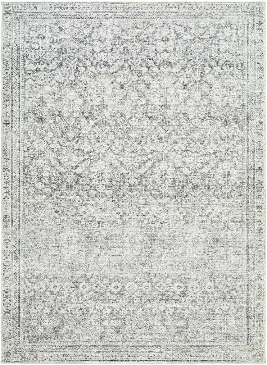 Close-up of Collins Avenue GACA-2303 rug. Machine-woven polyester rug in charcoal, cream, gray, and light gray with traditional pattern. Design-Rectangle-57