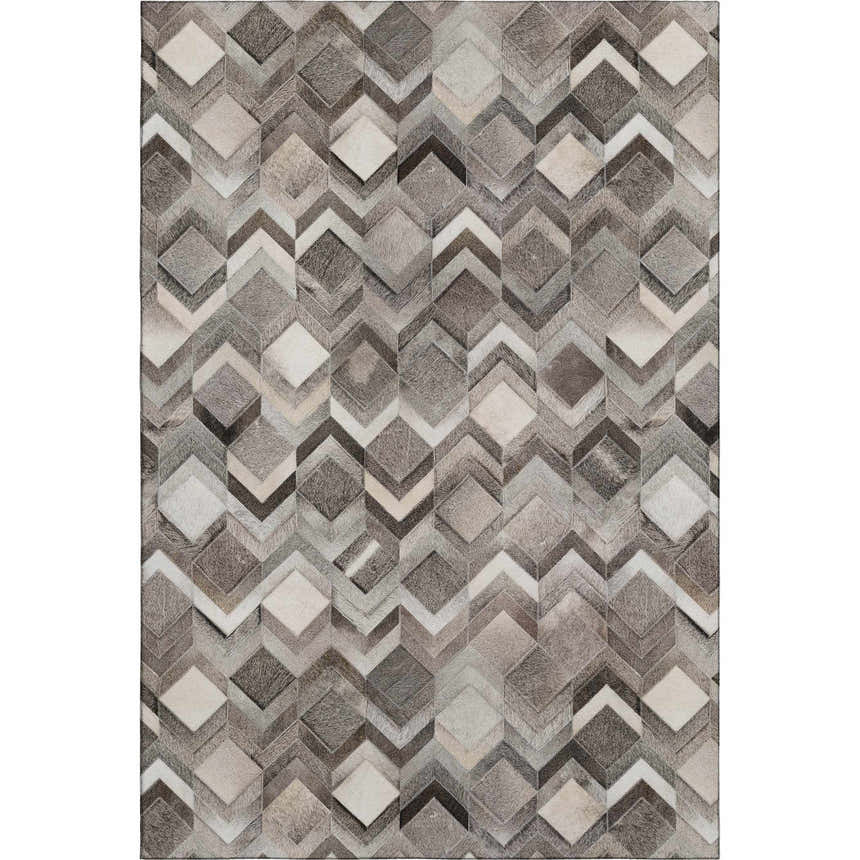 Close-up of the Dalyn Luxury Bozeman BM5 Gray Washable Area Rug, featuring a geometric diamond and chevron pattern in beige, black, and taupe.