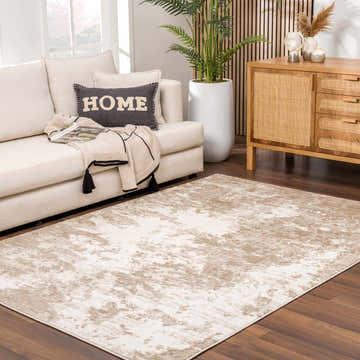 Living room scene with a Briley Beige Area Rug, cream sofa, wood cabinet, and potted plant. Roomscene-Rectangle