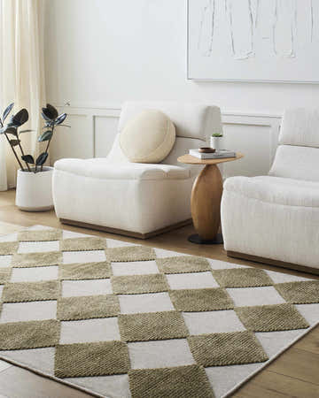 Living room scene with off-white chairs and Bosley Olive Washable Area Rug in a checkerboard pattern. Roomscene-Rectangle
